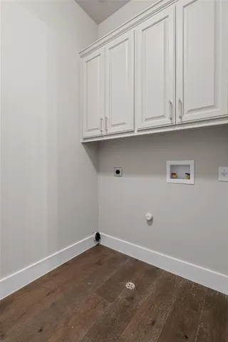 an empty room with cabinet