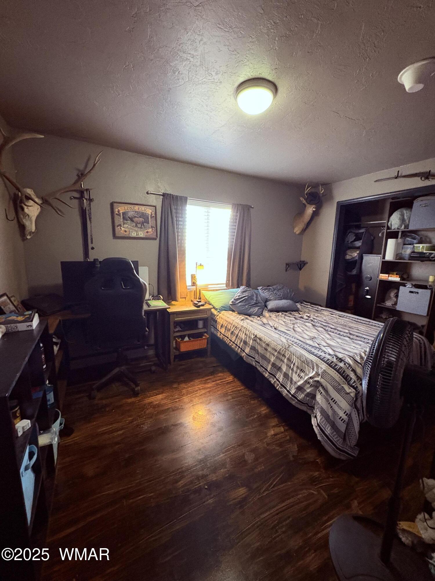 1 B County Road Concho, AZ 85924 - Photo 12 of 21 a bedroom with a bed window and dresser