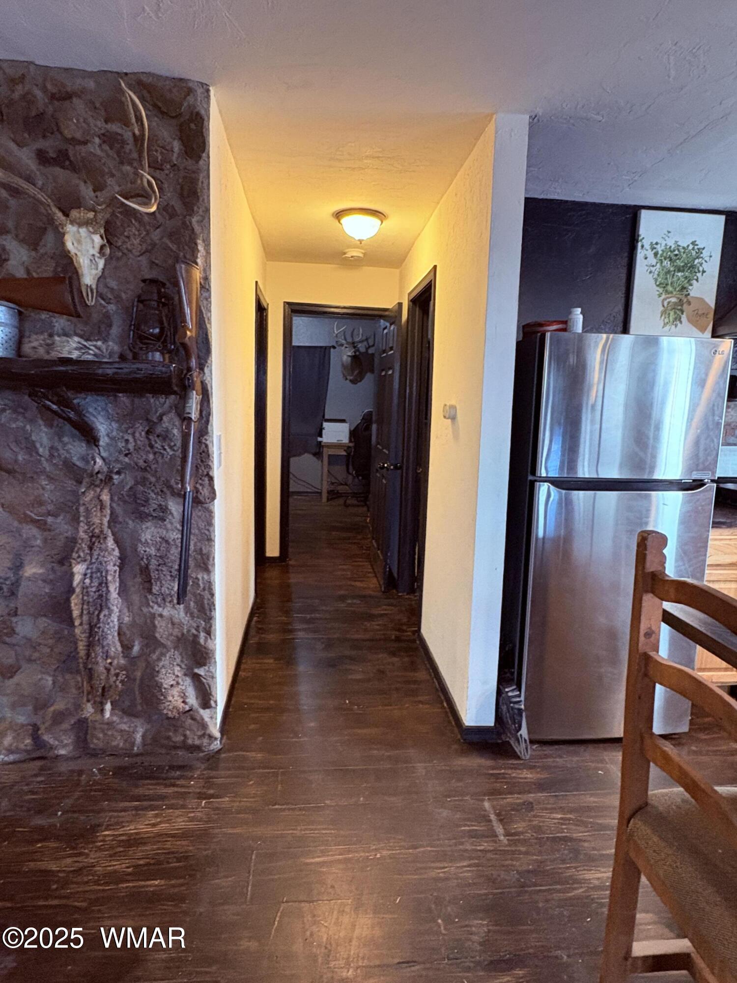 1 B County Road Concho, AZ 85924 - Photo 7 of 21 a view of a hallway with wooden floor and staircase