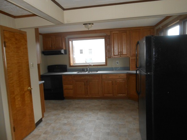 2015 East Street Three Rivers, MA 01080 - Photo 5 of 20 a kitchen with a sink and a refrigerator