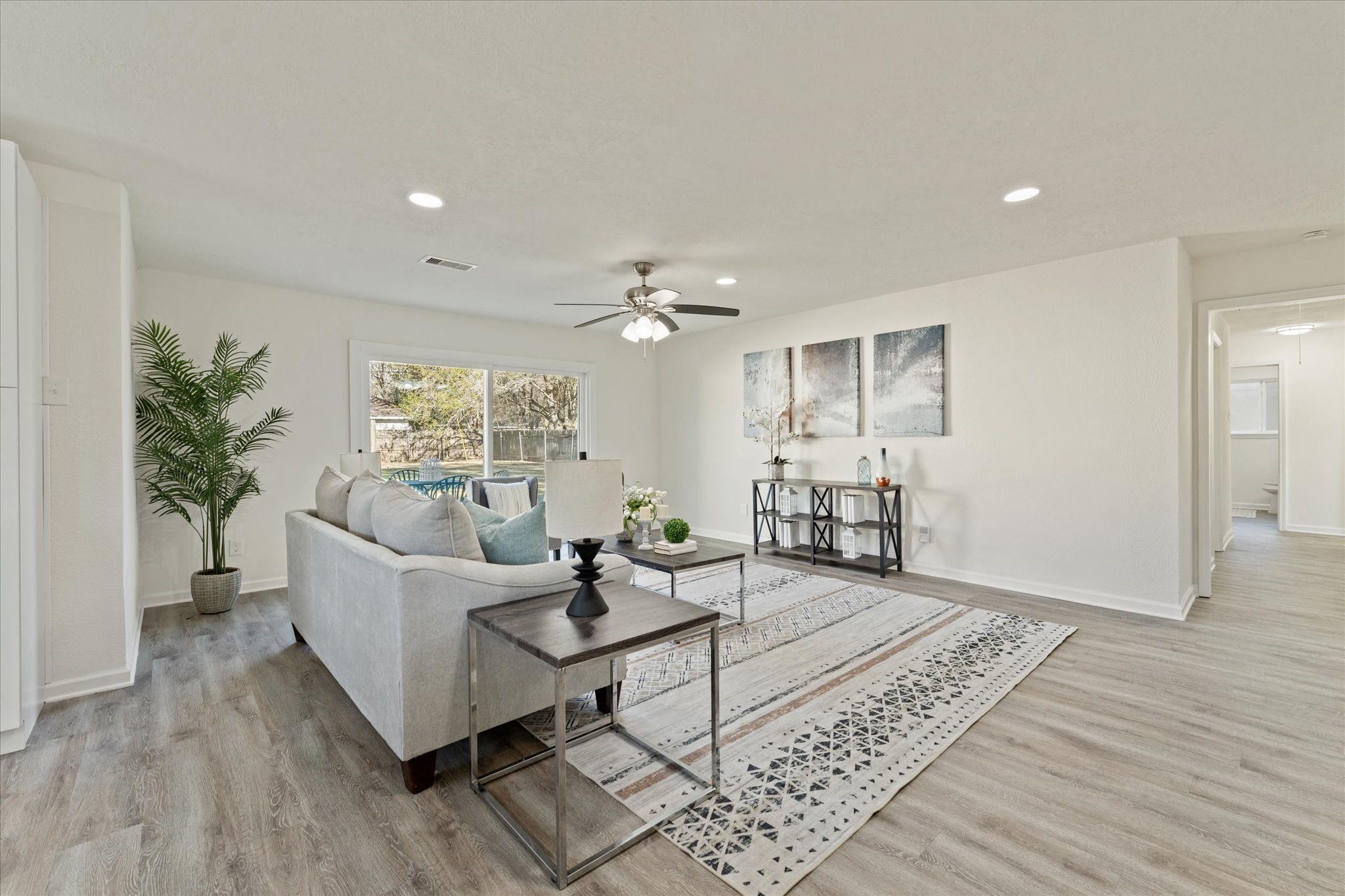6030 Beaudry Drive Houston, TX 77035 - Photo 12 of 45 a living room with furniture and wooden floor