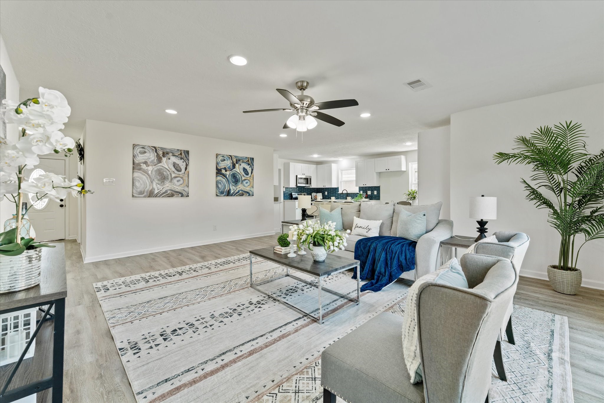 6030 Beaudry Drive Houston, TX 77035 - Photo 13 of 45 a living room with furniture and flowers