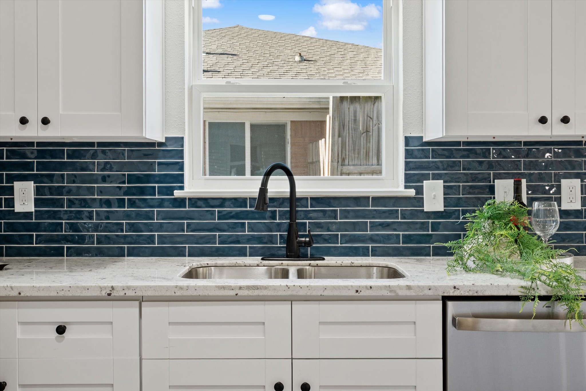 6030 Beaudry Drive Houston, TX 77035 - Photo 23 of 45 a kitchen with a sink and cabinets