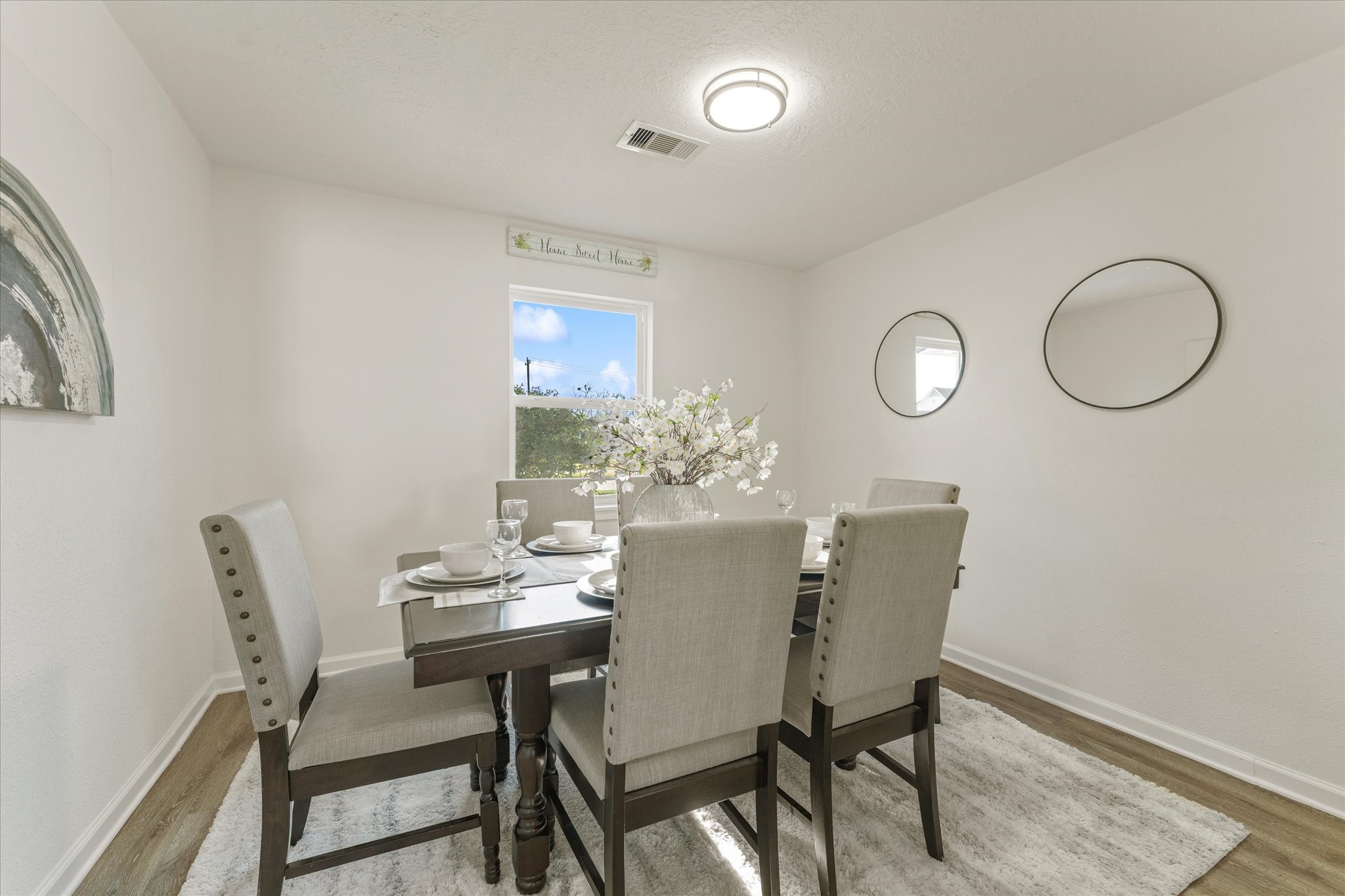 6030 Beaudry Drive Houston, TX 77035 - Photo 27 of 45 a view of a dining room with furniture and wooden floor