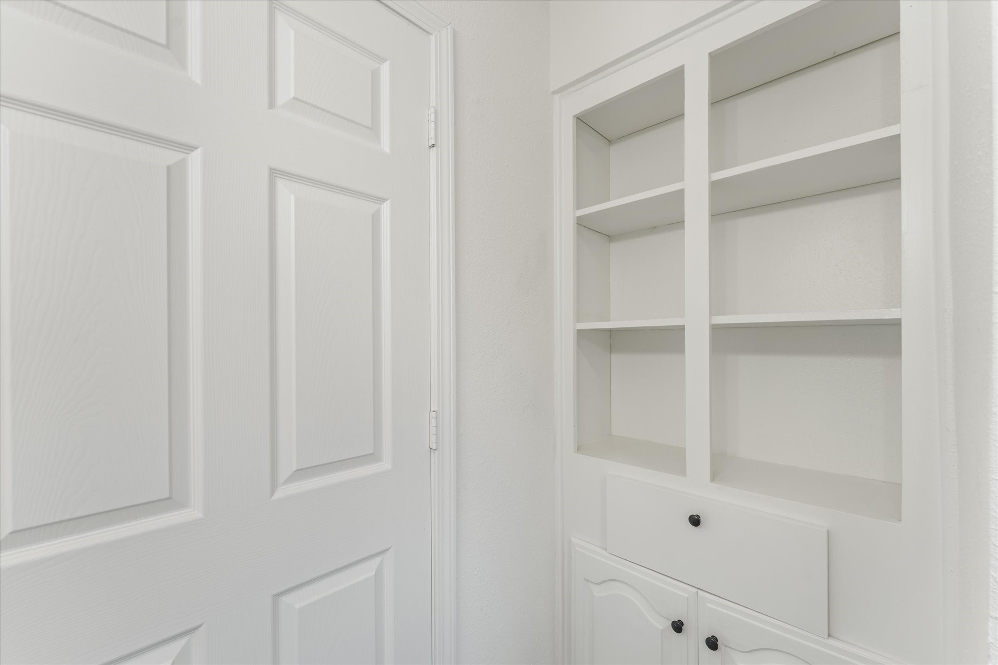 6030 Beaudry Drive Houston, TX 77035 - Photo 34 of 45 a view of an empty walk in closet