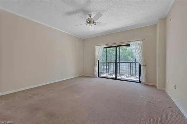 a view of a room with a large window