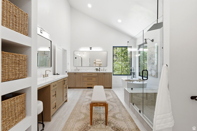 3027 Homestead Road Park City, UT 84098 - Photo 29 of 62 Vaulted ceiling bathroom featuring dual vanities with light wood cabinetry and white countertops