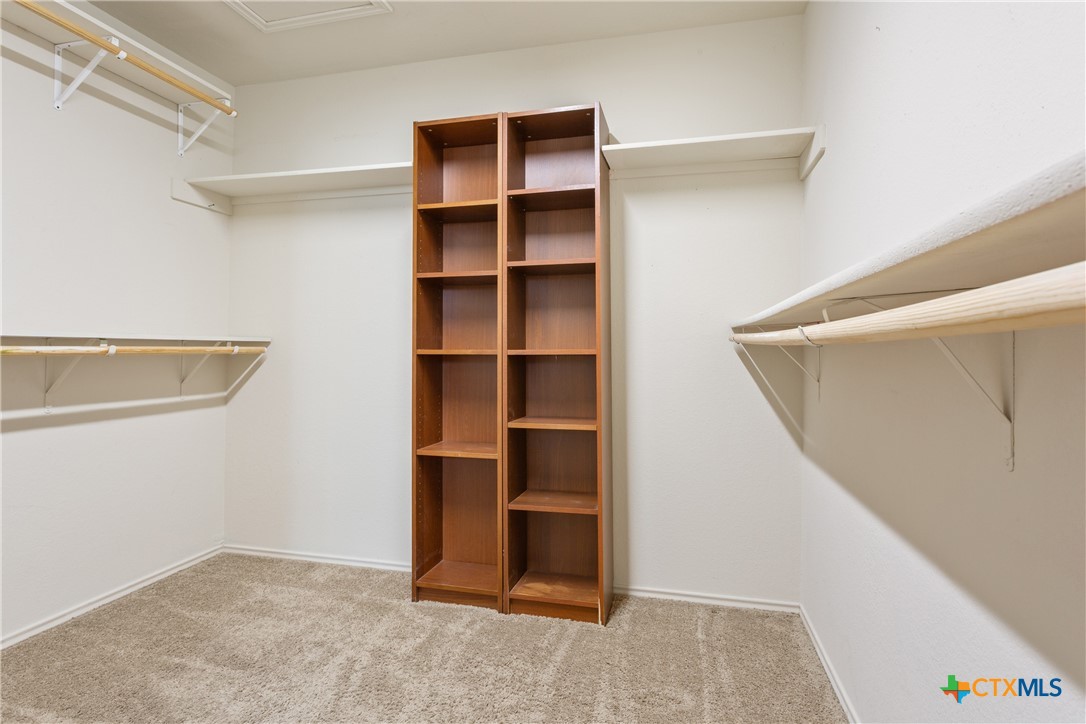 231 Druse Lane Jarrell, TX 76537 - Photo 19 of 38 a view of an empty walk in closet