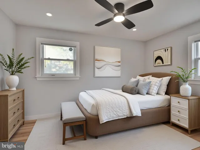 a bathroom with a sink toilet and mirror