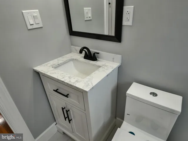 a bathroom with a sink and a toilet