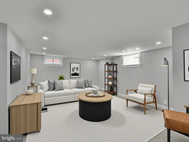 an empty room with a furniture and entryway