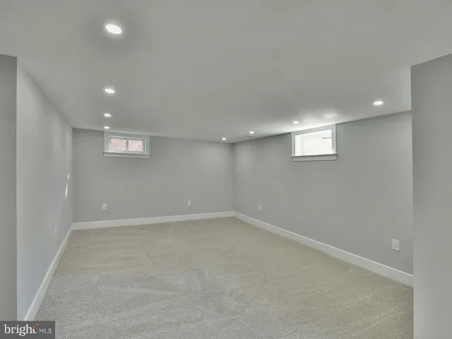 a view of an empty room and window