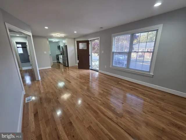 a kitchen with stainless steel appliances a sink dishwasher stove and microwave