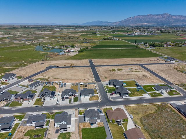 3150 South 5250 West, Unit 210 Hooper, UT 84315 - Photo 9 of 11 Developed residential area featuring completed streets and building lots