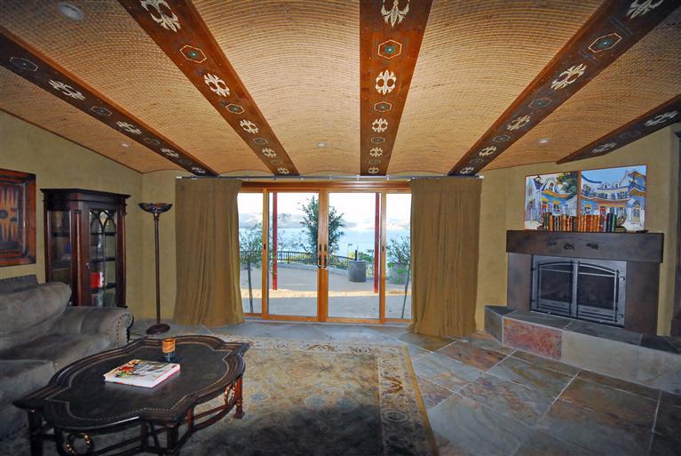 4678 Millerton Road Friant, CA 93626 - Photo 37 of 86 Game/Theater Room ~ This room boasts a unique multi-barrel ceiling with hand stenciled wood beams, large stone flooring, wet bar/kitchenette, and beautiful views, too!