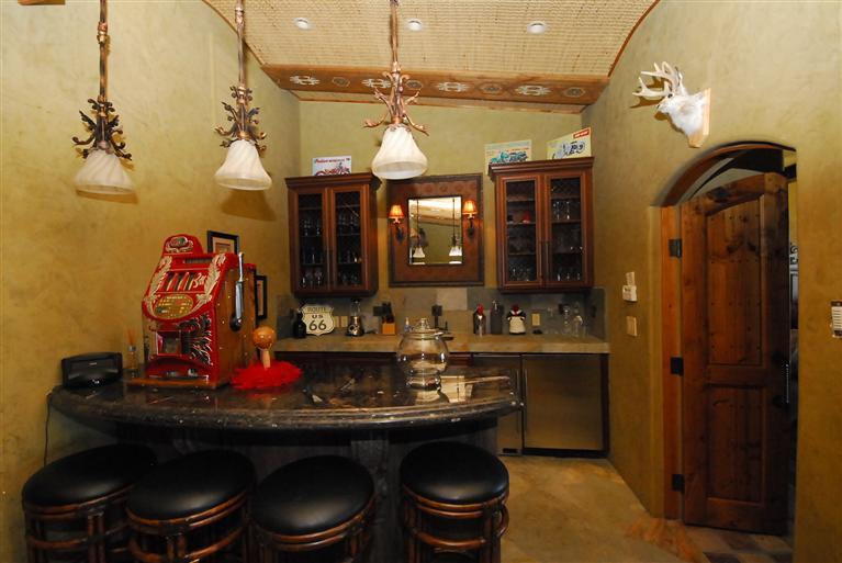 4678 Millerton Road Friant, CA 93626 - Photo 41 of 86 Game/Theater Room ~ Completing this room is a Wet Bar/Kitchenette with a gorgeous fossil marble counter top