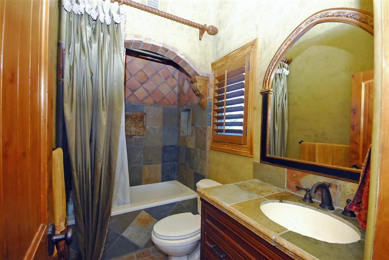 4678 Millerton Road Friant, CA 93626 - Photo 51 of 86 This is the guest bath with beautiful stone work.