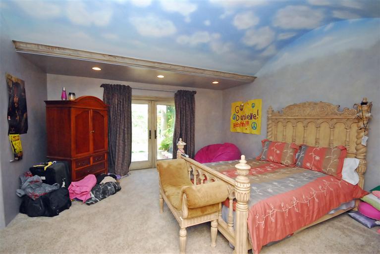 4678 Millerton Road Friant, CA 93626 - Photo 52 of 86 Bedroom 2 features an arched ceiling with fiberoptic star ceiling, walk in closet private bath and french doors leading to a beautiful garden area.