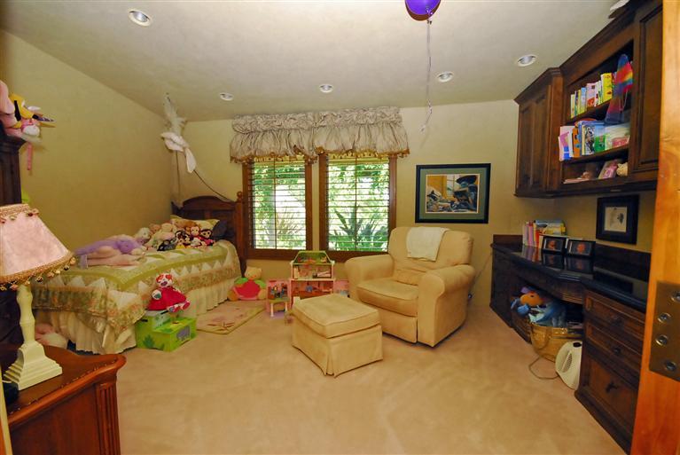 4678 Millerton Road Friant, CA 93626 - Photo 54 of 86 Bedroom 3 offers a built in dest area with over head cabinets and access to hall bath.