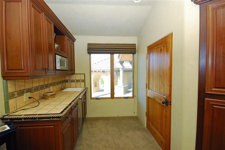 4678 Millerton Road Friant, CA 93626 - Photo 56 of 86 Private additional room Kitchenette with refrigerator and microwave. 2nd Laundry area behind door.