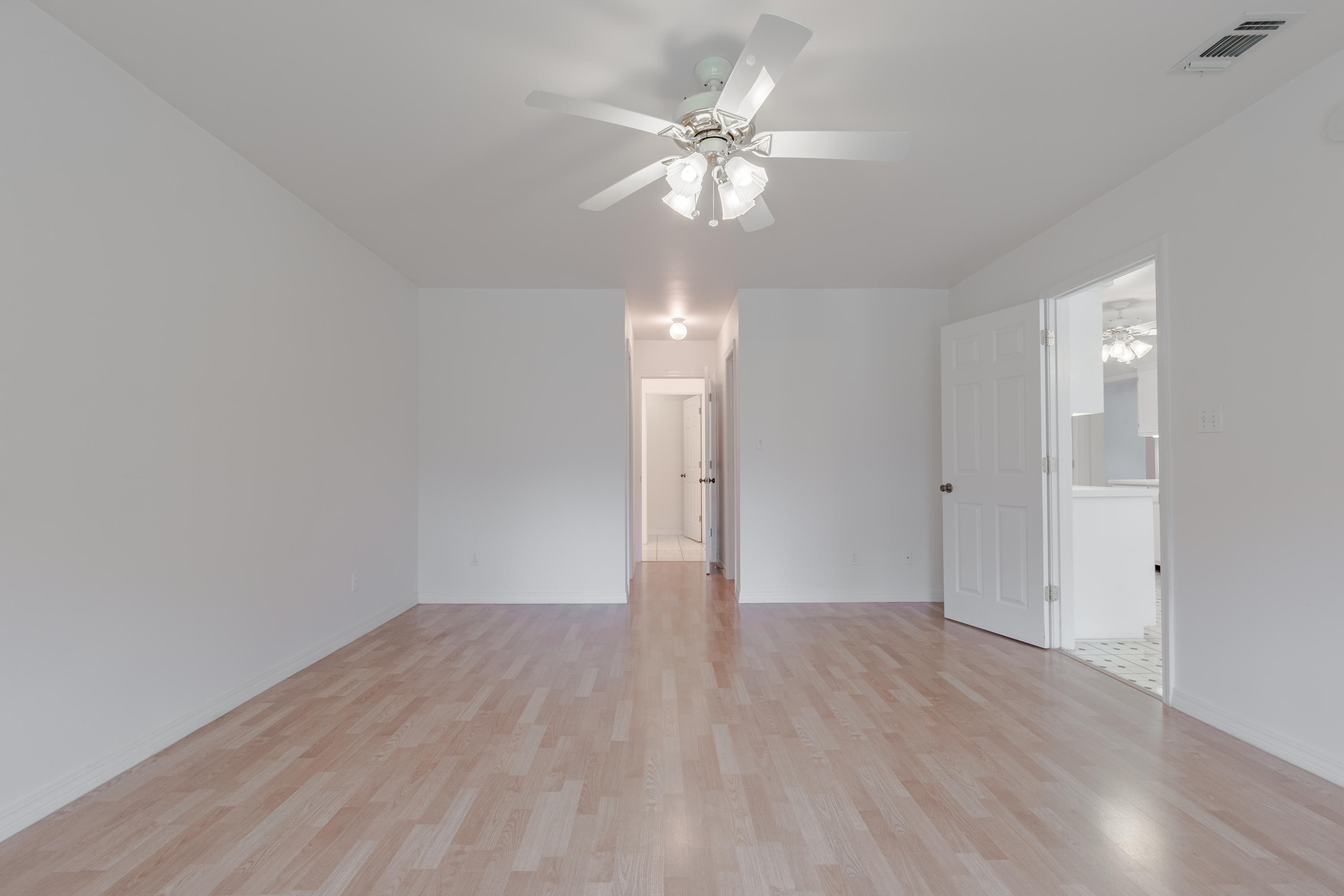 5909 Old Bethel Road Crestview, FL 32536 - Photo 23 of 47 a view of an empty room with wooden floor
