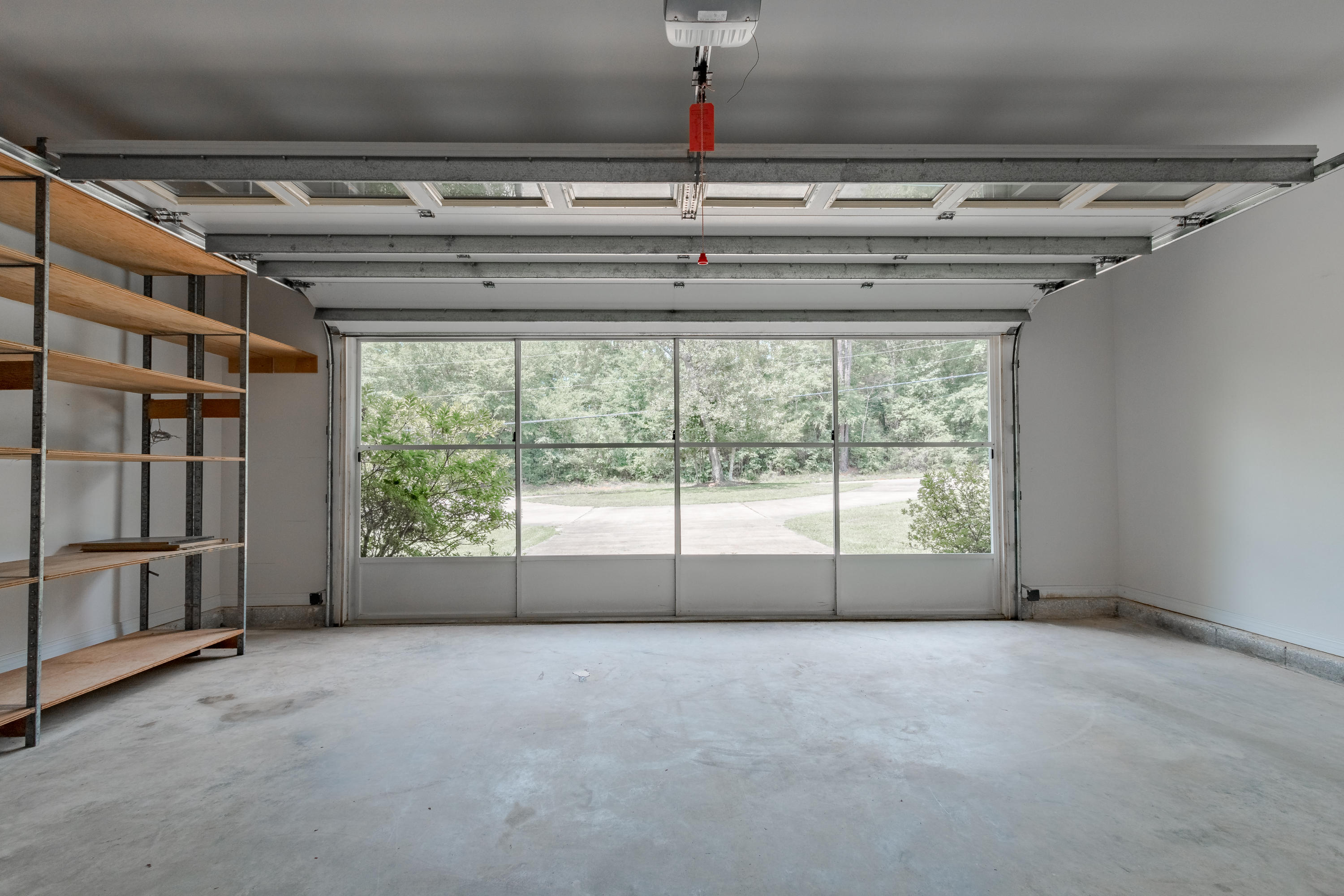 5909 Old Bethel Road Crestview, FL 32536 - Photo 40 of 47 a view of an empty room with a sliding door