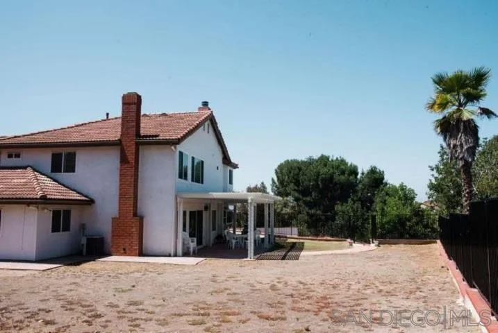 1615 Fuerte Ranch Road El Cajon, CA 92019 - Photo 11 of 17 a view of a house with a patio