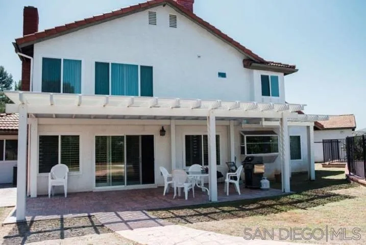 1615 Fuerte Ranch Road El Cajon, CA 92019 - Photo 13 of 17 a front view of a house with a large windows
