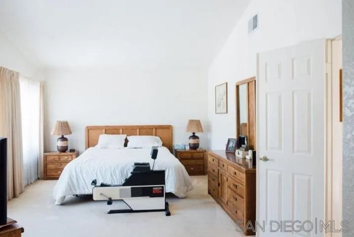 1615 Fuerte Ranch Road El Cajon, CA 92019 - Photo 7 of 17 a bedroom with a bed and a window