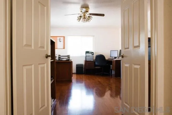 1615 Fuerte Ranch Road El Cajon, CA 92019 - Photo 10 of 17 a view of a workspace with furniture and a window