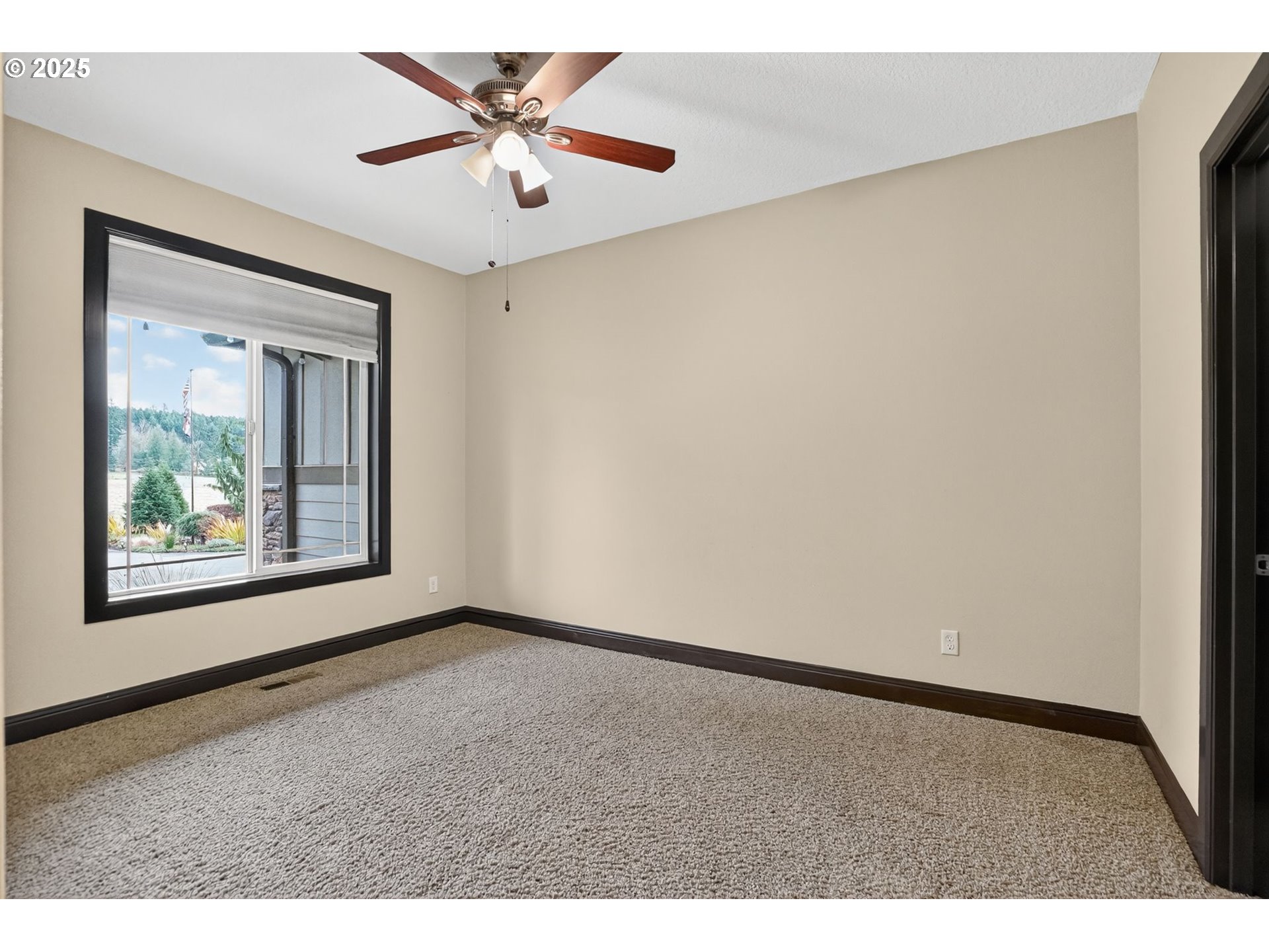 18740 South Upper Highland Road Beavercreek, OR 97004 - Photo 27 of 48 a view of an empty room with a window