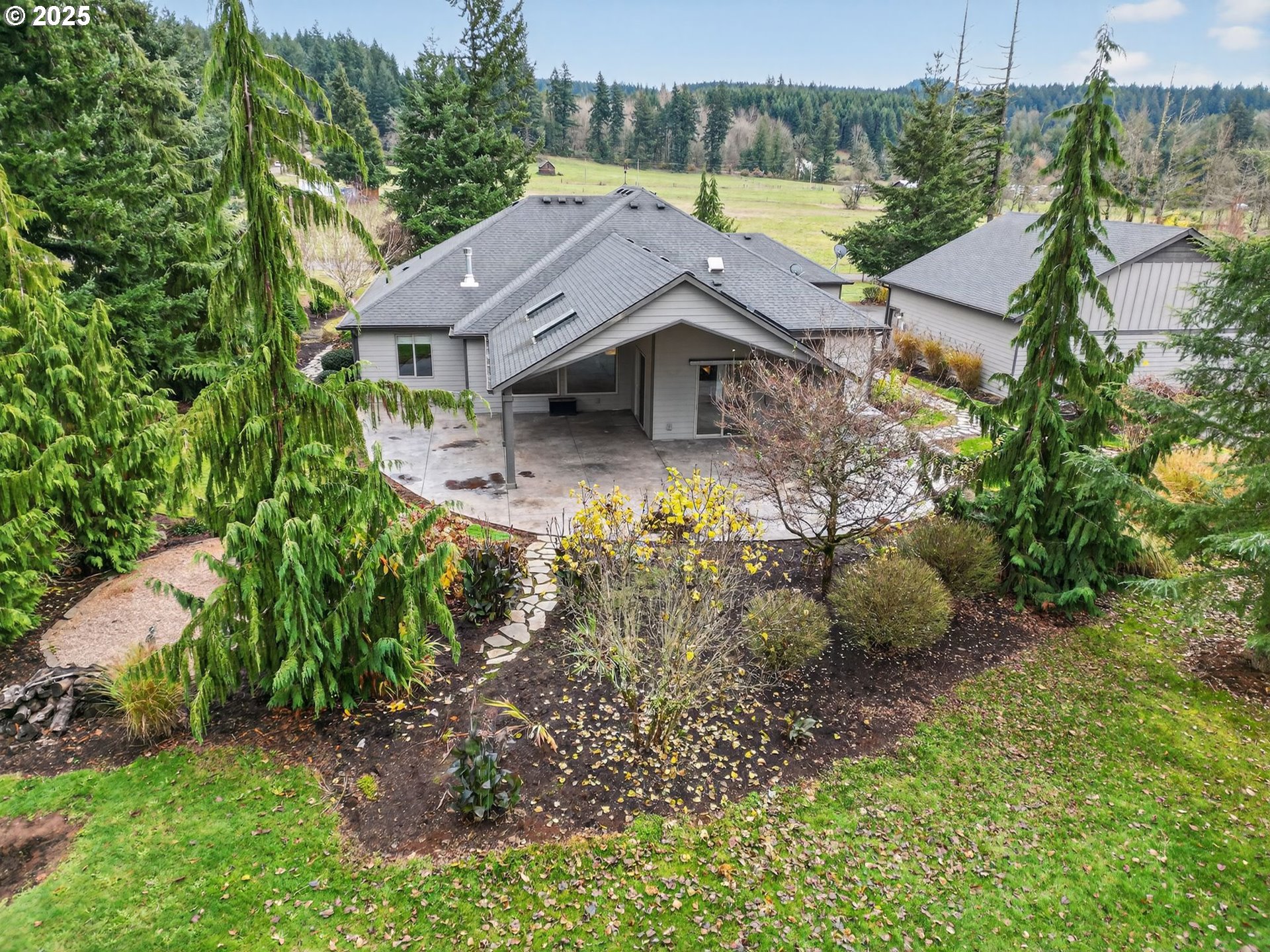 18740 South Upper Highland Road Beavercreek, OR 97004 - Photo 31 of 48 an aerial view of a house with yard swimming pool and outdoor seating