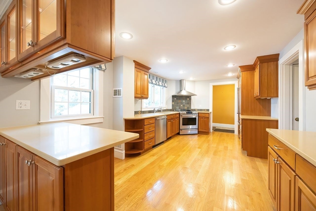 28 Exmoor Road Newton, MA 02459 - Photo 8 of 32 a kitchen with stainless steel appliances a sink and counter space