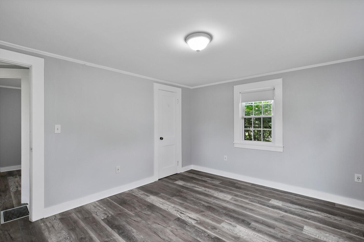 1 Gilbert Road Dennis Port, MA 02639 - Photo 15 of 27 a view of empty room with wooden floor