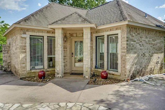 a view of a backyard of a house