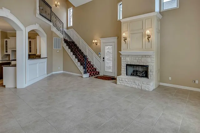 a kitchen with stainless steel appliances granite countertop a sink and cabinets