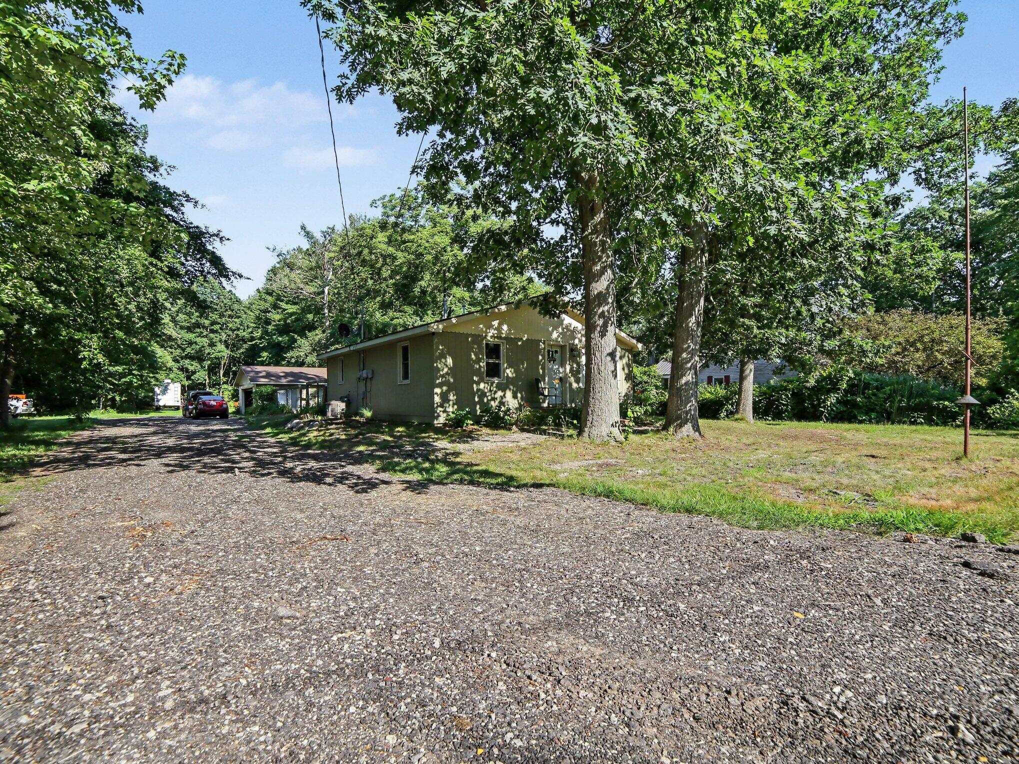 1460 South Mill Iron Road Muskegon, MI 49442 - Photo 20 of 26 Driveway/Front of Home