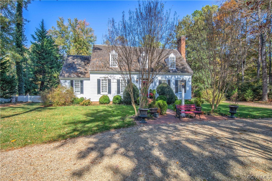 14420 West Salisbury Road Midlothian, VA 23113 - Photo 3 of 50 a view of a house with a yard and sitting area