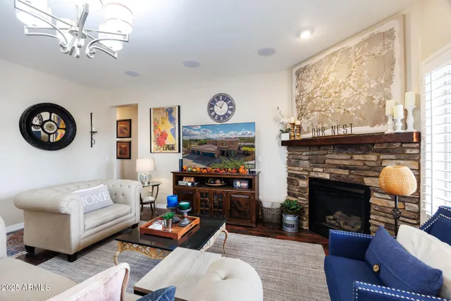 a bedroom with a bed chair and a window