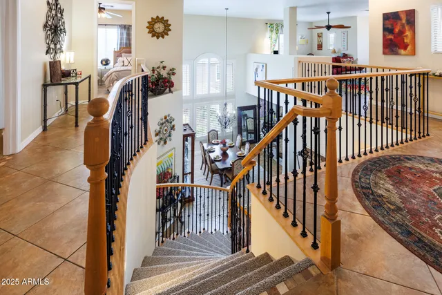a view of a patio with dining table and chairs