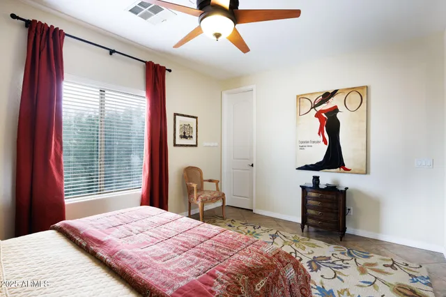 a view of a chairs and table in patio