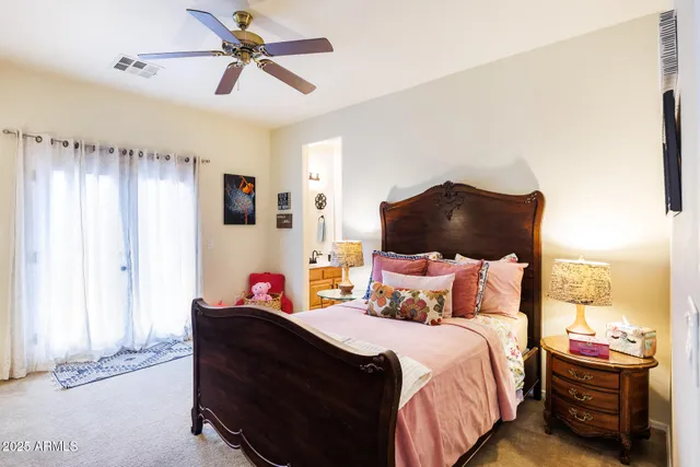 a view of a swimming pool with sitting area
