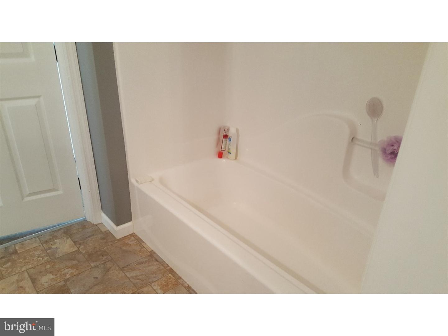 531 Clarks Pond Road Bridgeton, NJ 08302 - Photo 11 of 12 a black and white photo of a bathtub