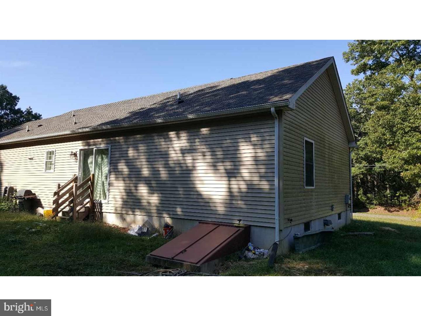 531 Clarks Pond Road Bridgeton, NJ 08302 - Photo 4 of 12 a black and white photo of a house