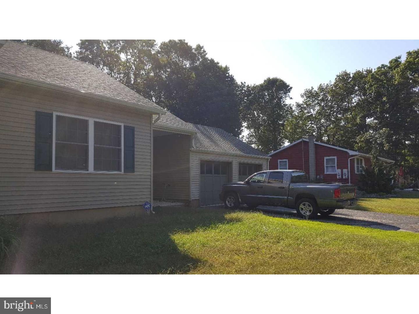 531 Clarks Pond Road Bridgeton, NJ 08302 - Photo 5 of 12 a black and white photo of a house