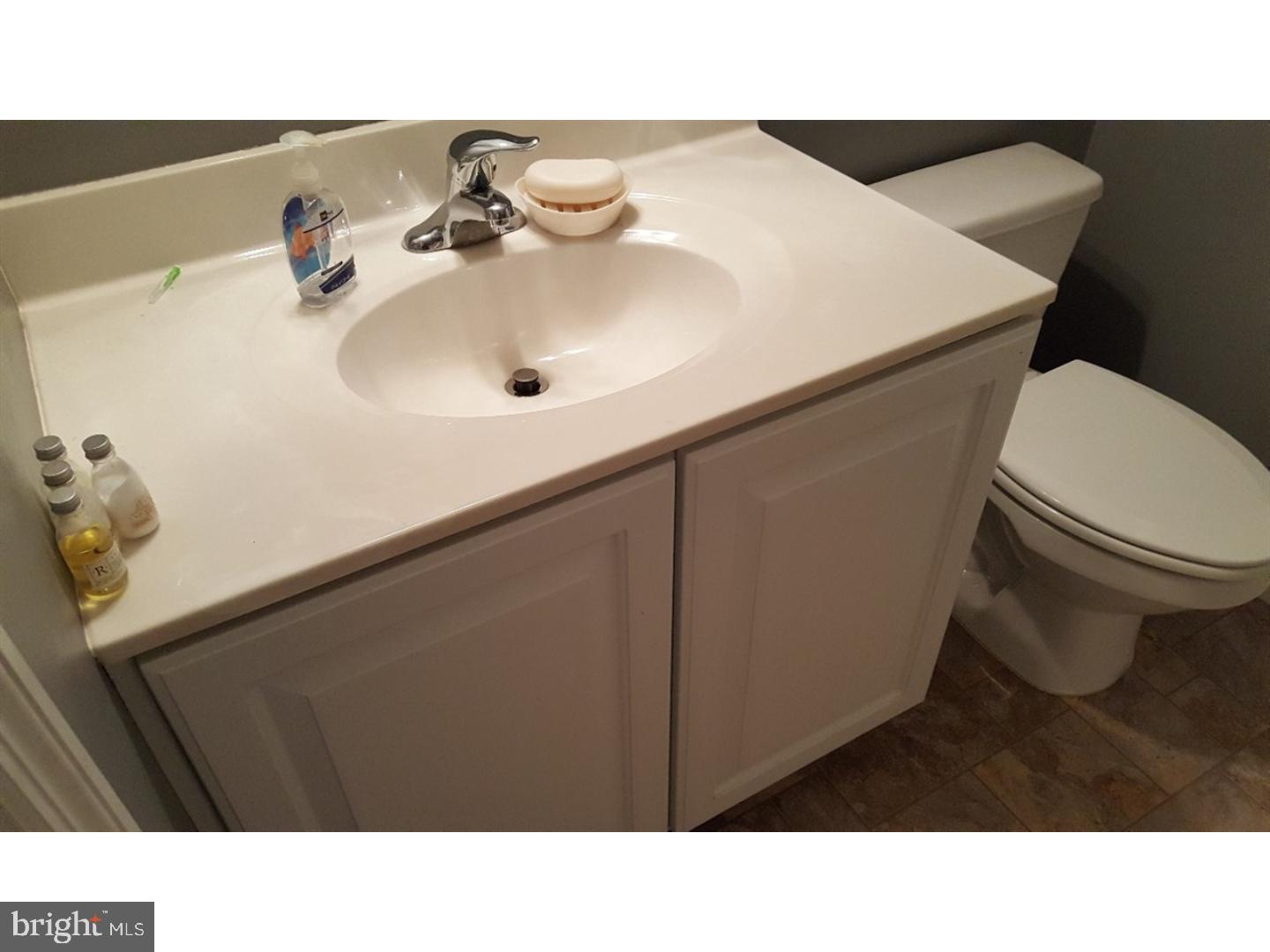 531 Clarks Pond Road Bridgeton, NJ 08302 - Photo 9 of 12 a bathroom with a sink and a mirror