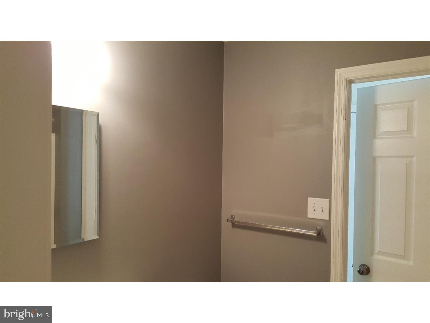 531 Clarks Pond Road Bridgeton, NJ 08302 - Photo 10 of 12 a open kitchen with a sink and a refrigerator