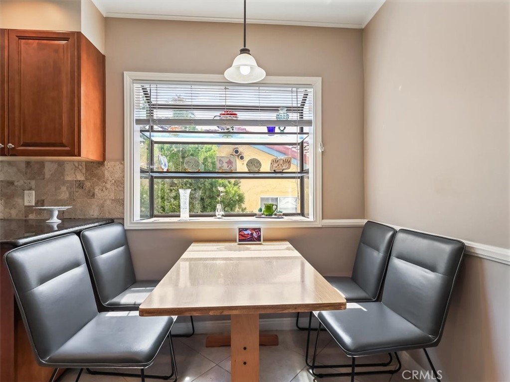 945 Rosemount Road Glendale, CA 91207 - Photo 19 of 31 a view of a dining room with furniture window and outside view