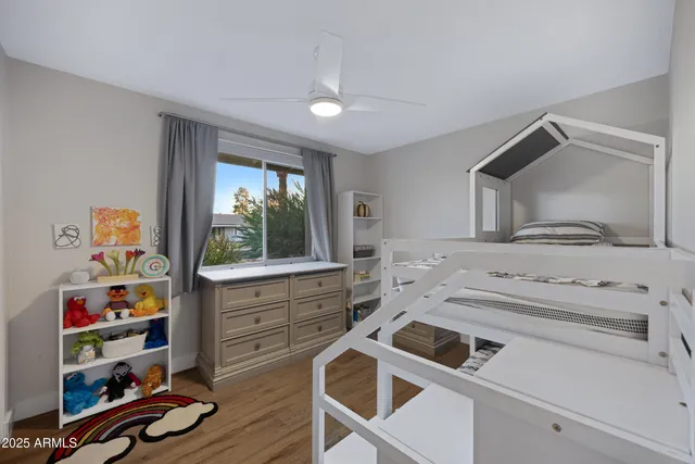 a kitchen with a stove a sink and a microwave