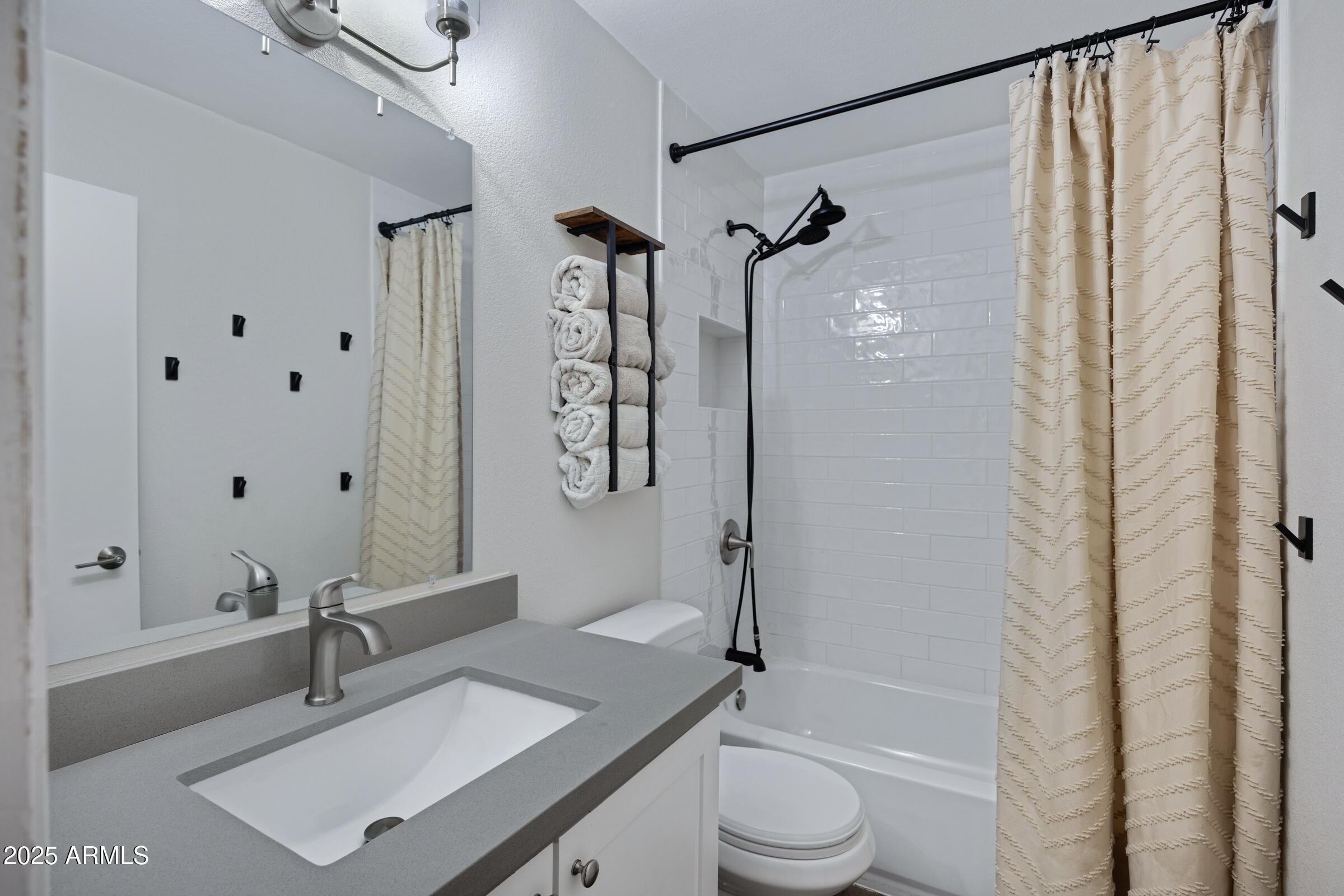 1824 West Seldon Lane Phoenix, AZ 85021 - Photo 16 of 34 a bathroom with a granite countertop sink a toilet and shower